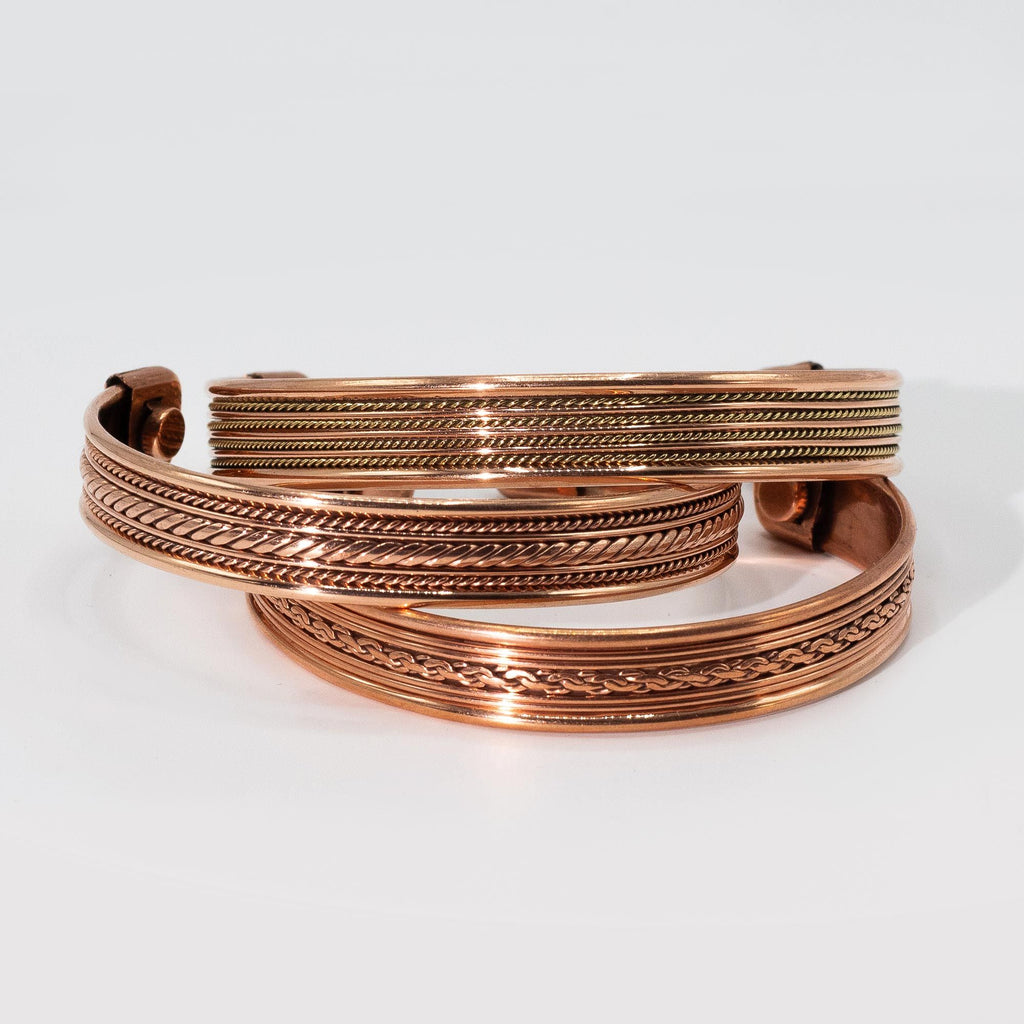 Pulseiras com design de íman e faixa de cobre (sortidas)