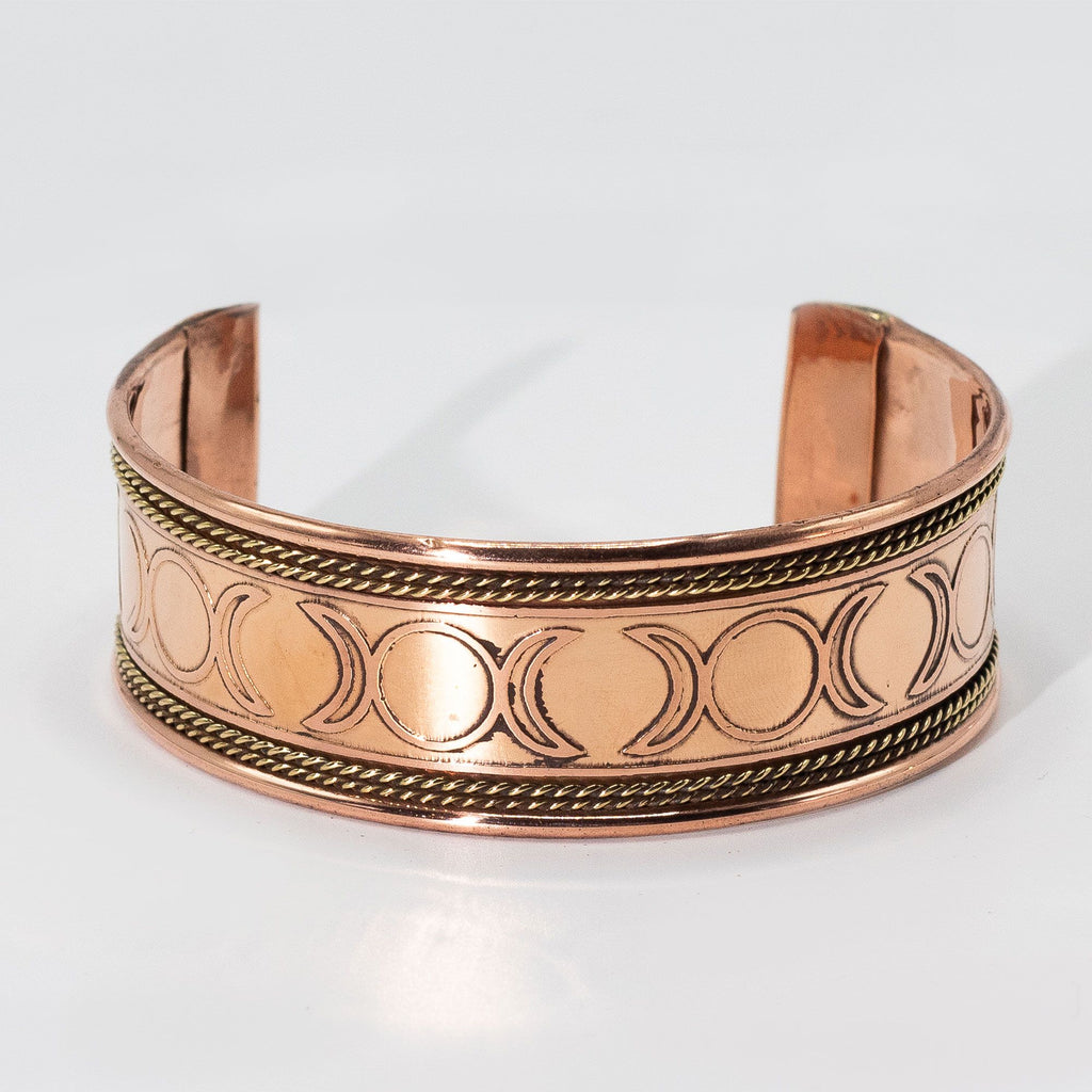 Pulseiras em cobre com faixa larga e decoração em latão (sortidas)