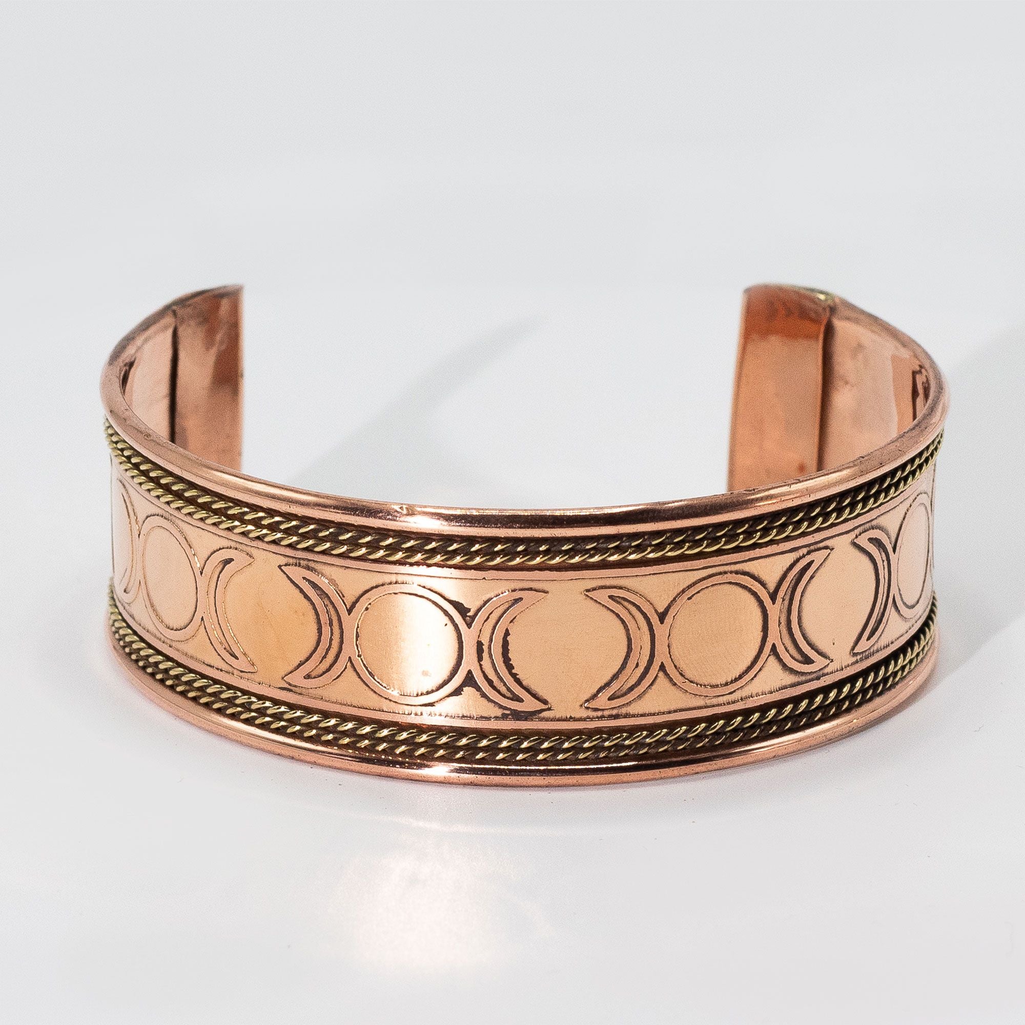 Pulseiras em cobre com faixa larga e decoração em latão (sortidas)